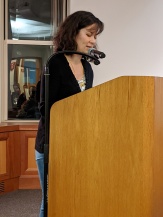 Sonya Larson: Image description - A woman standing at a podium.